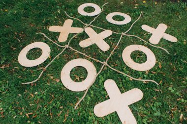 tic tac toe game outside on grass season summer clipart