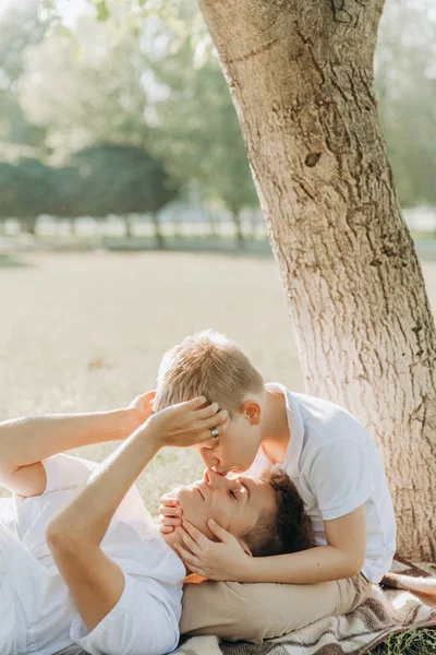 Family mom son hug play outside lifestyle — Stock Photo, Image