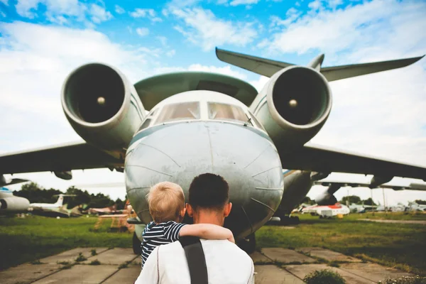 father son retro aviation museum exploring plane