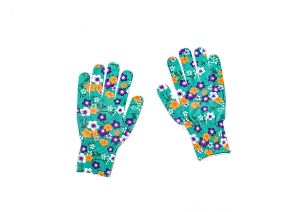 Женские перчатки голубые цветы рабочий сад — стоковое фото