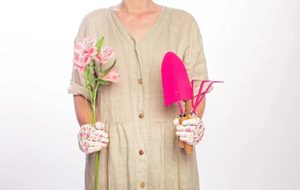 Women gardener tools pink colored bouquet flowers — 스톡 사진