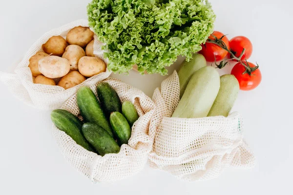 Set products eco mesh bag tomato zucchini — Stock Photo, Image