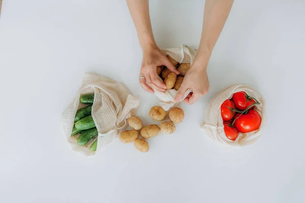 Set products eco mesh bag tomato zucchini — Stock Photo, Image