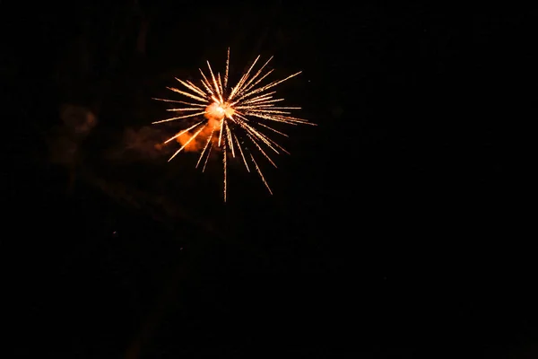 Explosion fireworks colored in dark sky — Stock Photo, Image