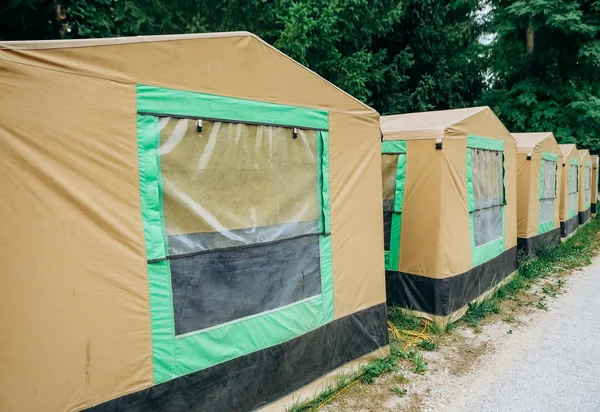 tents group row camping park forest nature recreation