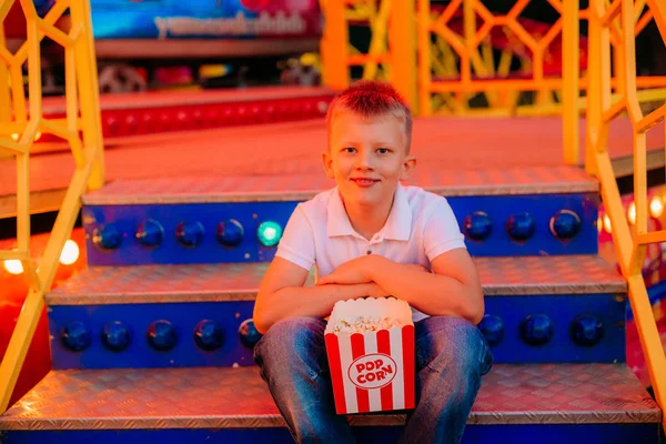 Popcorn child festival fair colorful background blur