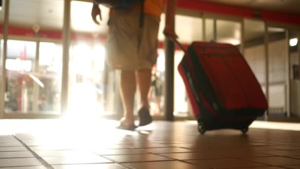 Cinematic Shot Man Leaving Airport Terminal Golden Sunlight Vacation — Stock Video