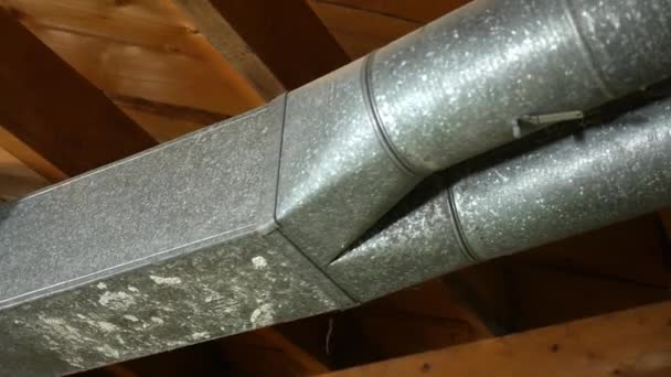 Panning across a air conditioning HVAC ventilation air shaft - duct work - V1 — Stock Footage Panning Air Conditioning Hvac Ventilation Air Shaft Duct Work Video Clip