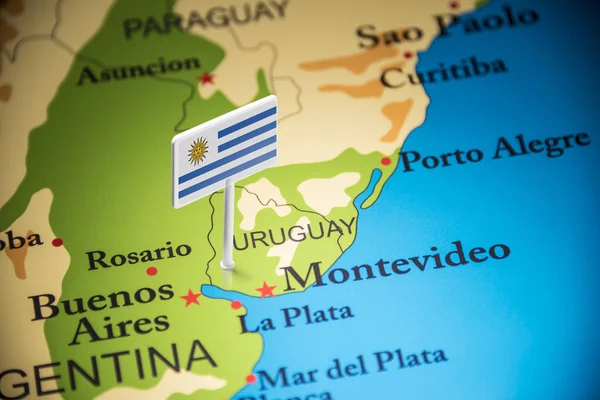 Uruguay gemarkeerd met een vlag op de kaart — Stockfoto