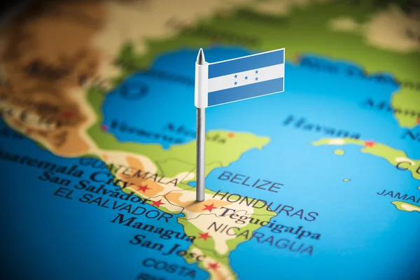 Honduras marcado con una bandera en el mapa — Foto de Stock