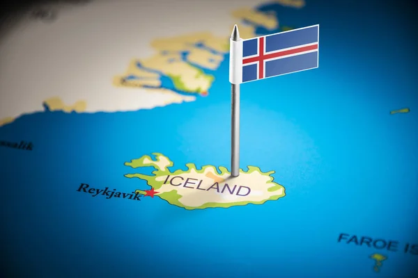 Iceland marked with a flag on the map — Stock Photo, Image