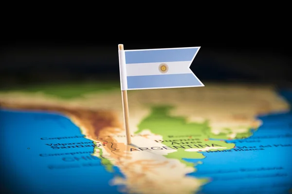 Argentina marcada com uma bandeira no mapa — Fotografia de Stock