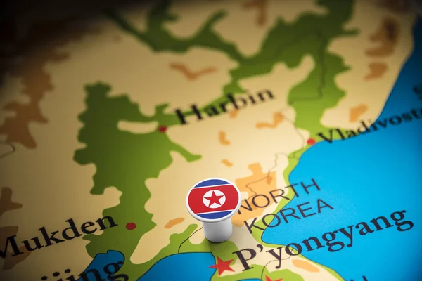 North Korea marked with a flag on the map — Stock Photo, Image