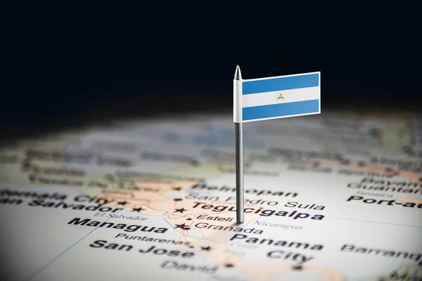 Nicaragua gemarkeerd met een vlag op de kaart — Stockfoto