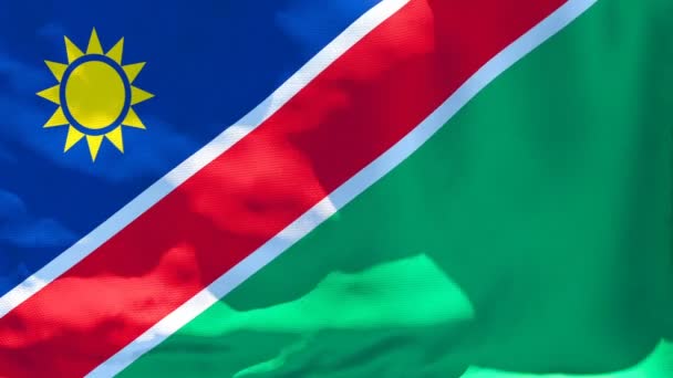 The national flag of Namibia flutters in the wind — Stock Video