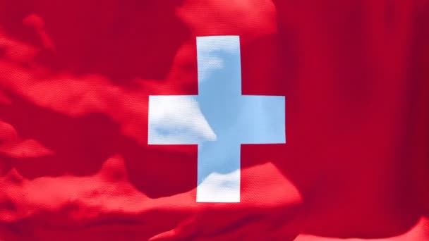 Le drapeau national de la Suisse flotte dans le vent — Video