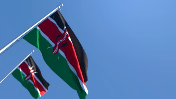Kenya bayrağı mavi gökyüzüne karşı rüzgarda dalgalanıyor. — Stok video