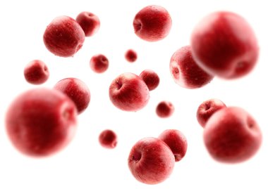 Kırmızı elmalar beyaz arkaplanda uçar