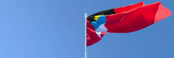 Representación 3D de la bandera nacional de Barbuda ondeando en el viento — Foto de Stock