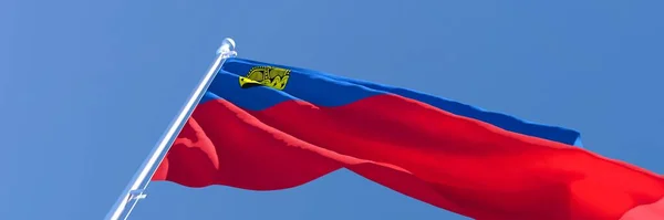 Representación en 3D de la bandera nacional de Liechtenstein ondeando al viento — Foto de Stock