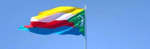 Representación en 3D de la bandera nacional de Comoras ondeando al viento — Foto de Stock