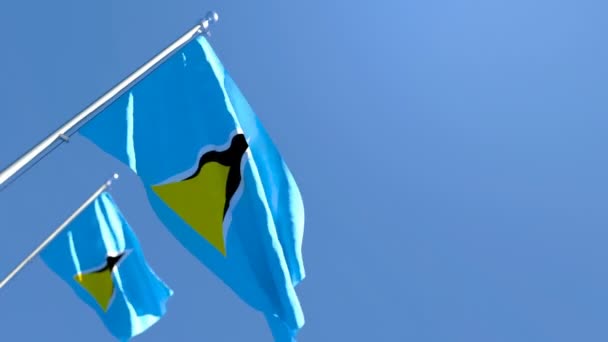 De nationale vlag van Saint Lucia wappert in de wind — Stockvideo