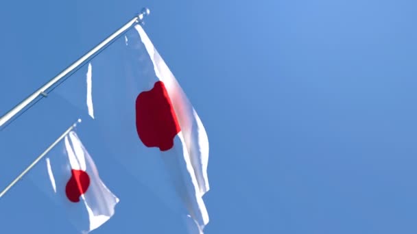 La bandera nacional de Japón ondea al viento — Vídeo de stock