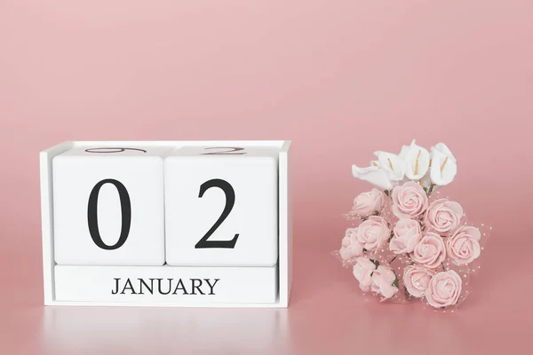 02 de Janeiro. Dia 2 do mês. Calendário cubo sobre fundo rosa moderno, conceito de bussines e um evento importante . — Fotografia de Stock