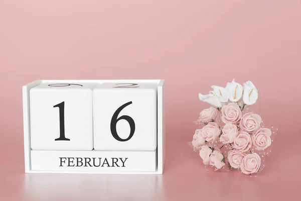 16 de febrero. Día 16 del mes. Cubo de calendario sobre fondo rosa moderno, concepto de negocios y un evento importante . —  Fotos de Stock