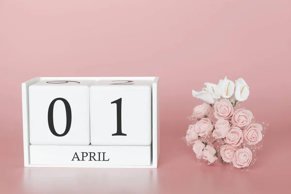4月1日, 每月的第一天。日历立方体在现代粉红色背景, 商业概念和一个重要事件. — 图库照片