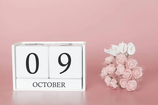 09 de Outubro. Dia 9 do mês. Calendário cubo sobre fundo rosa moderno, conceito de bussines e um evento importante . — Fotografia de Stock