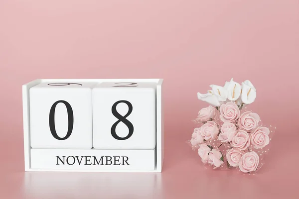 08 de Novembro. Dia 8 do mês. Calendário cubo sobre fundo rosa moderno, conceito de bussines e um evento importante . — Fotografia de Stock