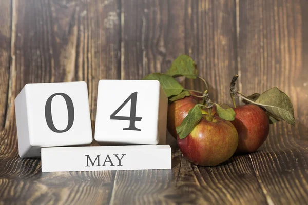 May Day Month Calendar Cube Wooden Background Red Apples Concept — Stock Photo, Image