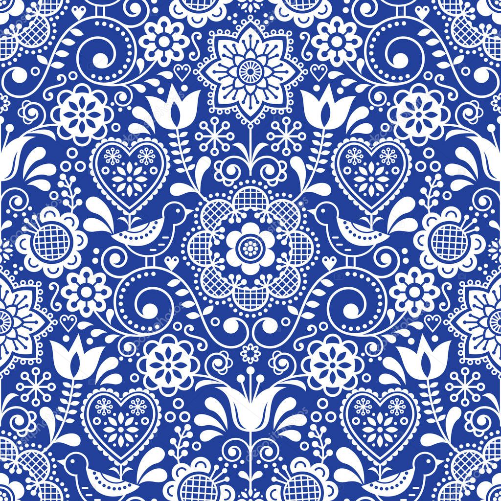 Seamless folk art vector pattern with birds and flowers, Scandinavian repetitive floral design in white on navy blue. Retro style navy blue ornament, Scandi cute background perfect for textile design, wallpaper