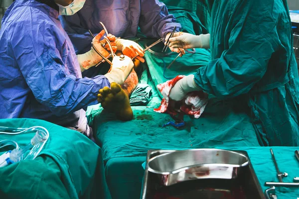 Shot of emergency and serious accident. . The doctor is undergoing surgery to save a life from an accident. Concepts of surgery and emergency accident.