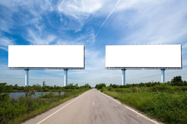 blank billboard on the sideway in the park. image for copy space, advertisement, text and object. white billboard in natural green. Blank billboard ready for new advertisement.