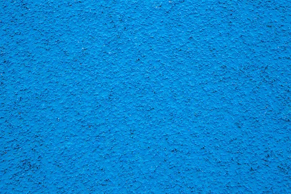 Running track sports texture. Running track rubber cover. Tartan track material is the trademarked all-weather synthetic track surfacing for athletics made of polyurethane.Blue tartan athletic running