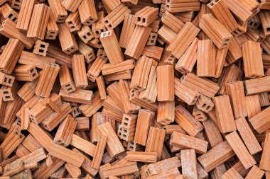 tuğla kare inşaat malzemeleri grubu. tuğla doku ve soyut arka plan veya metin doldurmak için kopya alanı için vinyet. Düzensiz kahverengi tuğla yığını.