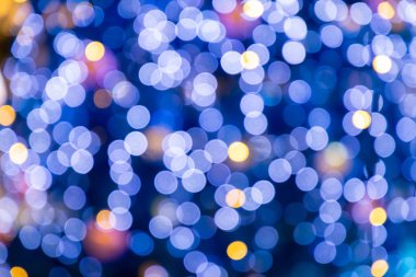 Bulanık bokeh ışık arka plan, Noel ve Yeni Yıl tatili arka plan. Kopya alanı ile renkli güzel bulanık bokeh arka plan. Tatil dokusu. Glitter çok renkli ışık lekeleri.