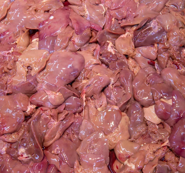 Fresh pork kidney market, Closeup of fresh kidney Pork selling in market.Chicken livers.Chicken livers for sell in fresh market.Chicken feet ready to cook.Chicken livers background.