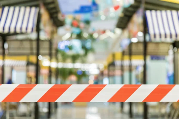 Red and White Lines of barrier tape. Striped, red and white tape that forbids passage. Red White warning tape pole fencing is protects for No entry.