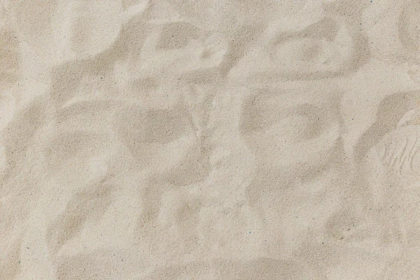 Natural sand stone texture background. sand on the beach as background. Art cream concrete texture for background in black. color dry scratched surface wall cover sand art abstract colorful relief.