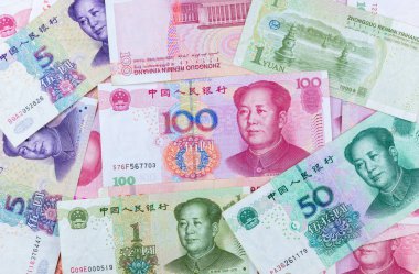 birçok tip çin banknotlar, yuan para yığını. dünya ekonomisini etkileyen para birimidir. para oyunu güçleri. ekonomi ve fon kavramı.