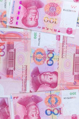 birçok tip çin banknotlar, yuan para yığını. dünya ekonomisini etkileyen para birimidir. para oyunu güçleri. ekonomi ve fon kavramı.