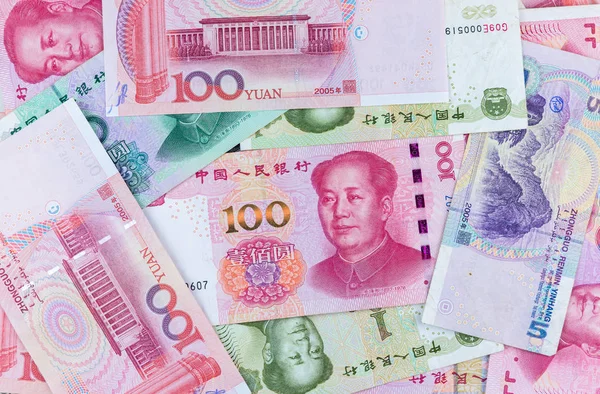 birçok tip çin banknotlar, yuan para yığını. dünya ekonomisini etkileyen para birimidir. para oyunu güçleri. ekonomi ve fon kavramı.