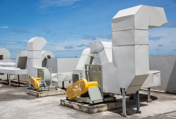 Industrial air conditioning units. Industrial air conditioning and ventilation systems on roof.