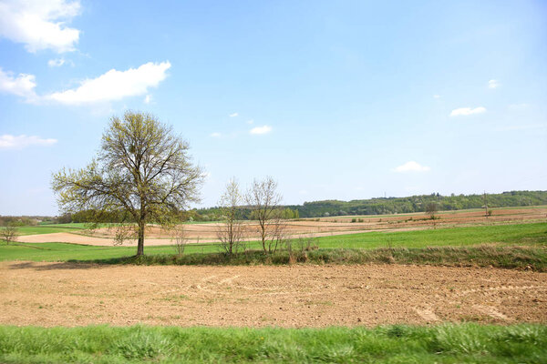 Springtime view of extensive farmland in the countryside.