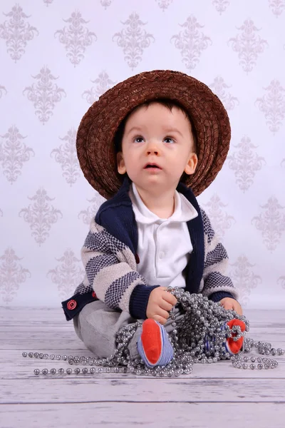 Cute Little Boy Straw Hat Sitting Necklace Wooden Floor — Stock Photo, Image