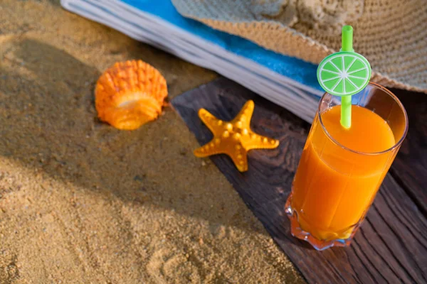 Fresh Orange Fruit Juice Stands Glass Straw Beach Towel Lies — Stock Photo, Image