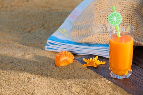 Fresh Orange Fruit Juice Stands Glass Straw Beach Towel Lies — Stock Photo, Image